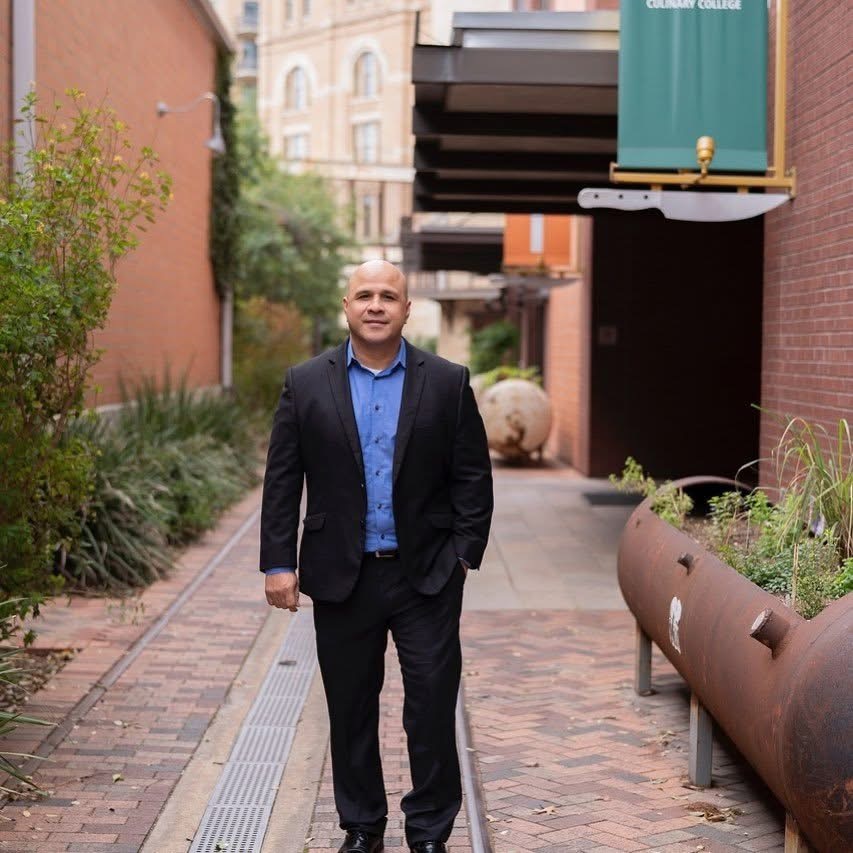 Israel Hernandez walking through downtown San Antonio